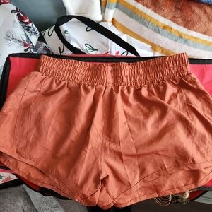 NWOT burnt orange Leg3nd shorts